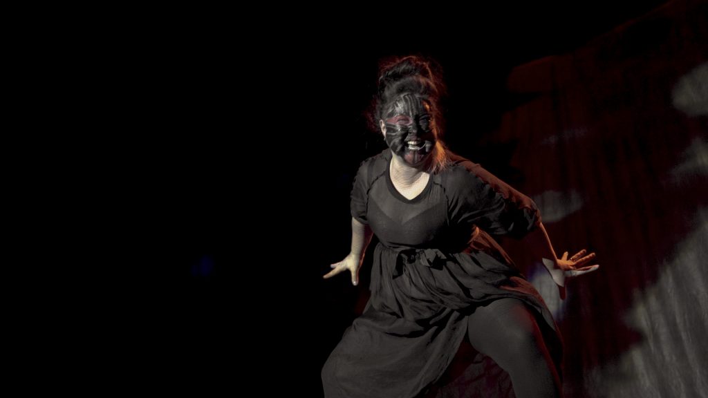 Laakkuluk emerges onstage as Uaerneeq dancer